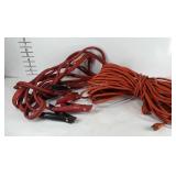 Large extension cord and jumper cables, extension