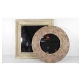 Two wall hanging mirrors, one round and one