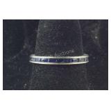 Sterling silver band with  stones size 6