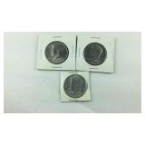 Three Kennedy halves, two 1974 and one