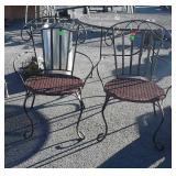 Pair of Outdoor Chairs, wrought iron with wicker