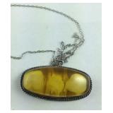 Amber Colored Pendant With Sterling Silver