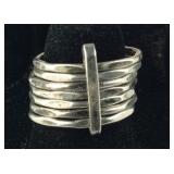 Seven Sterling Silver Rings Attached 7 grams,