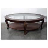 Wooden oval coffee table with glass top, 30" x