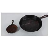Two cast iron skillets, larger of the two is 8",
