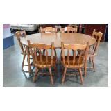 Oval dining table with chairs, 42 x 65 with two