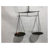 Hanging balance scales with brass trays,