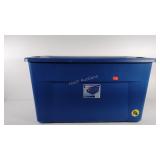 Empty tote with lid has wheels on the bottom,