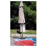 4 Various Outdoor Umbrellas with one Stand,
