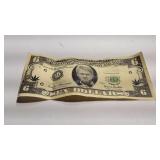 Comical fake bill with Bill Clinton face