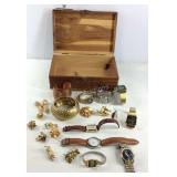 Jewelry box with jewelry, watches, and pins