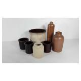 Crockery group, bottles, cheese crocks, etc.,