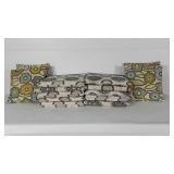 Eight chair cushions and four throw pillows, some