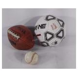 Box of  footballs, soccer balls, baseballs,