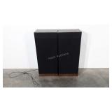 Two speakers, 8" x 12" x 28"