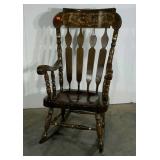 Large wooden rocking chair with tole paint detail