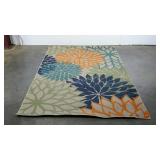 Indoor/outdoor rug, bold floral design, 63" x 89"