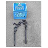 Plastic crate with chain binders