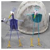 Two home made garden decor statues