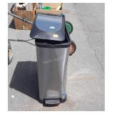 Stainless steel trashcan does have dent in it,