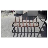 Fire place log holder