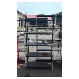 Metal shelving unit, six feet tall missing top