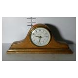 Battery operated mantle clock. 16" wide.