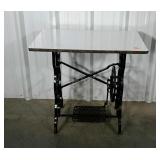 Iron sewing machine treadle base with formula