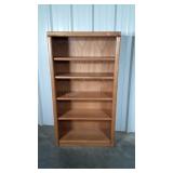 Oak Bookcase. 5 shelves 4 are adjustable heights