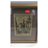 Three framed pictures of city  scenes