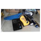 Box of flashlights, answer machine, shoe inserts,