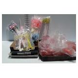 Two flats of floral arrangements markers