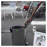 Trashcan with hockey sticks