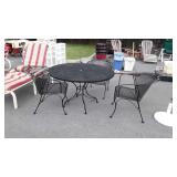 Wrought Iron patio table and 4 chairs, 47" in