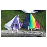 Two Beach Umbrellas with ground poles and one