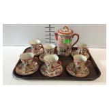 Asian theme teapot with set of 6 cups & saucers