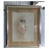 Framed picture of lady