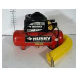 HUSKY Whisper 68, 2 gal air compressor with hose.