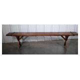 Walk Board Bench. Early wooden board on bench