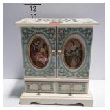 Musical jewelry box cabinet and costume jewelry,
