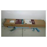 Two pieces. Window blind in box and grabber.