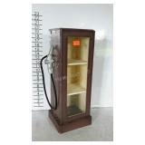 Small CD cabinet made to look like a gas pump.