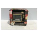 F.A.O. Schwarz lighted Holiday musical figurine TV