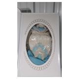 Two Wedding Gowns one white one blue in