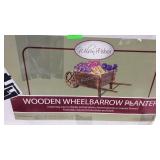 Wooden wheelbarrow planter, needs assembly