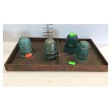 4 Glass electric insulators in divided tray -