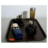 Five Avon cologne bottles with some cologne.