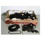 Beaded Necklaces. Twenty-seven bundles of a