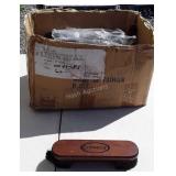 Box of pool table cleaning brushes