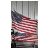 Two American Flags, on flag pole other just